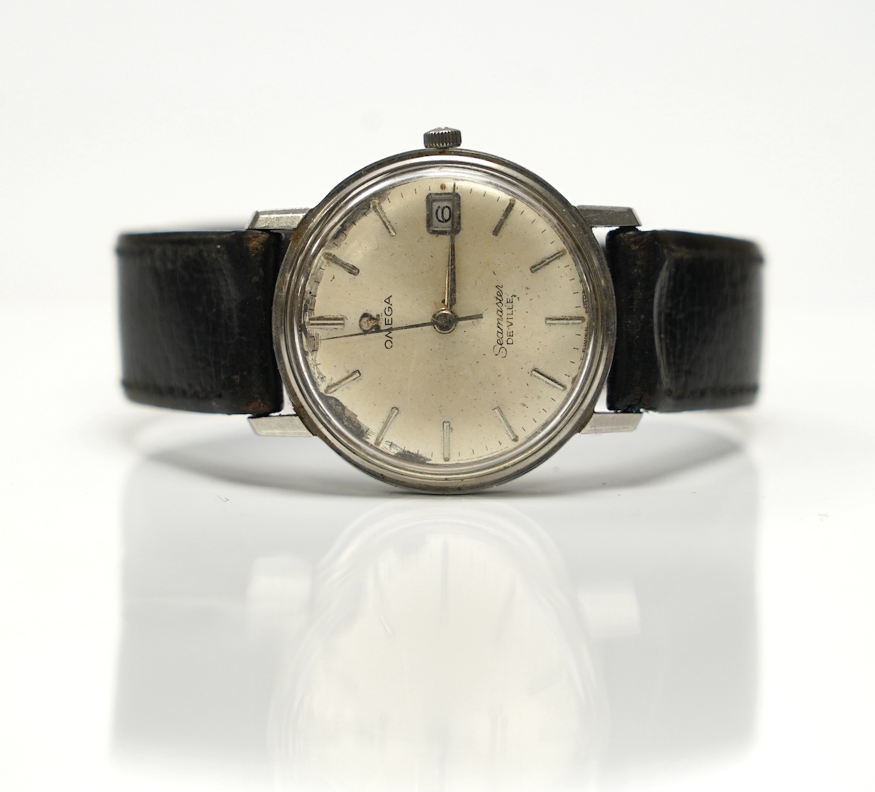 A gentleman's stainless steel Omega Seamaster DeVille manual wind wrist watch, on associated leather strap, case diameter 34mm. Condition - poor